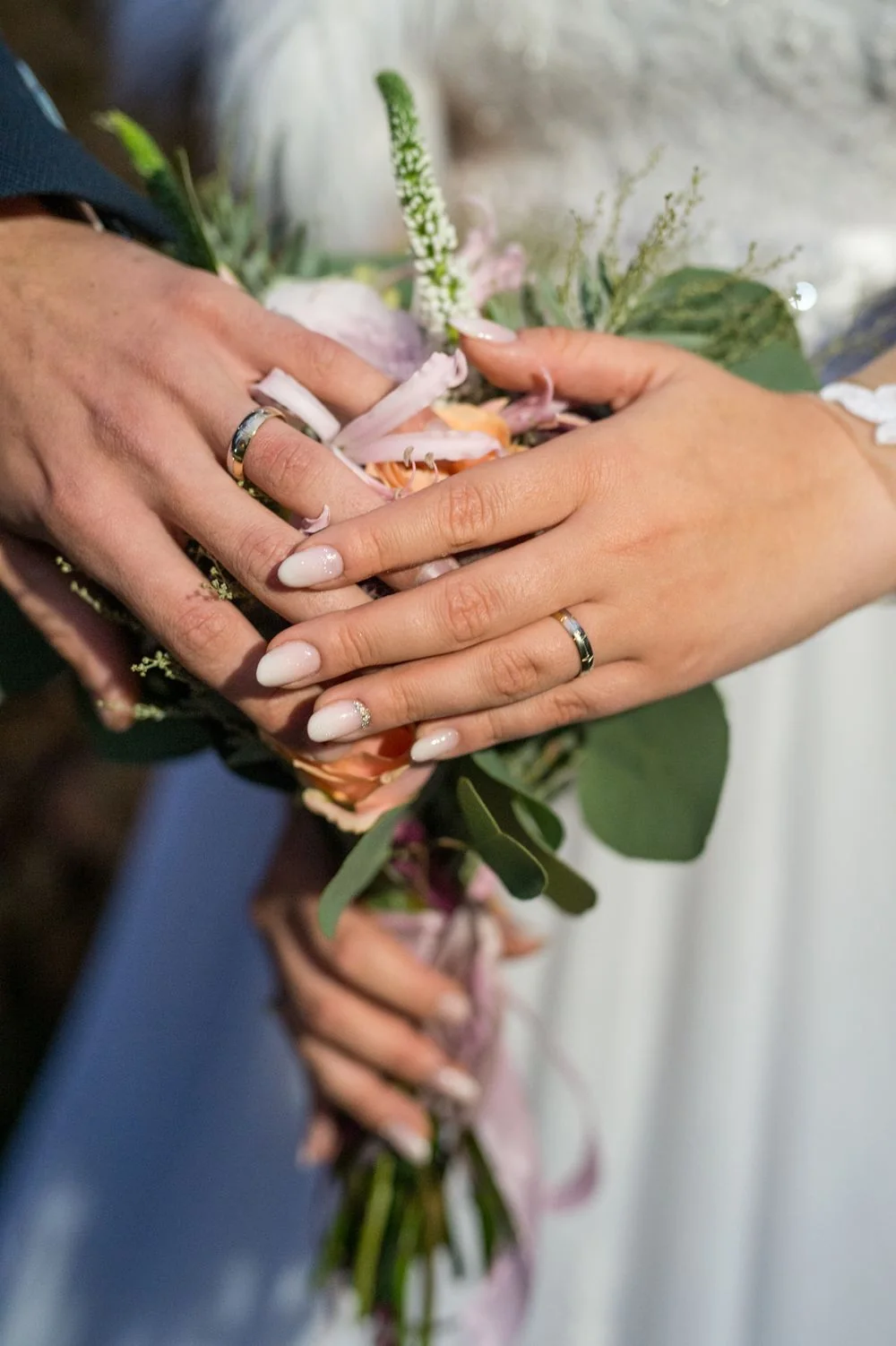 Wedding rings and a bouquet, representing a meaningful ceremony